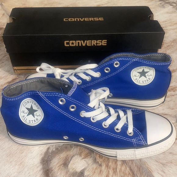 Royal Blue high top sneakers By Converse. NWT, men 10